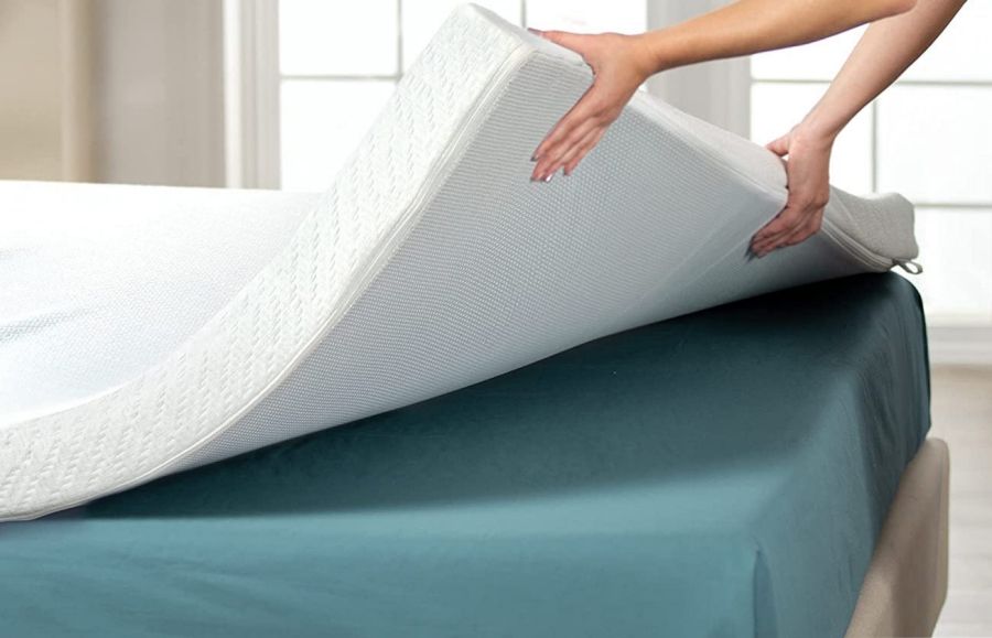 How do you prevent your mattress topper from sliding off the bed